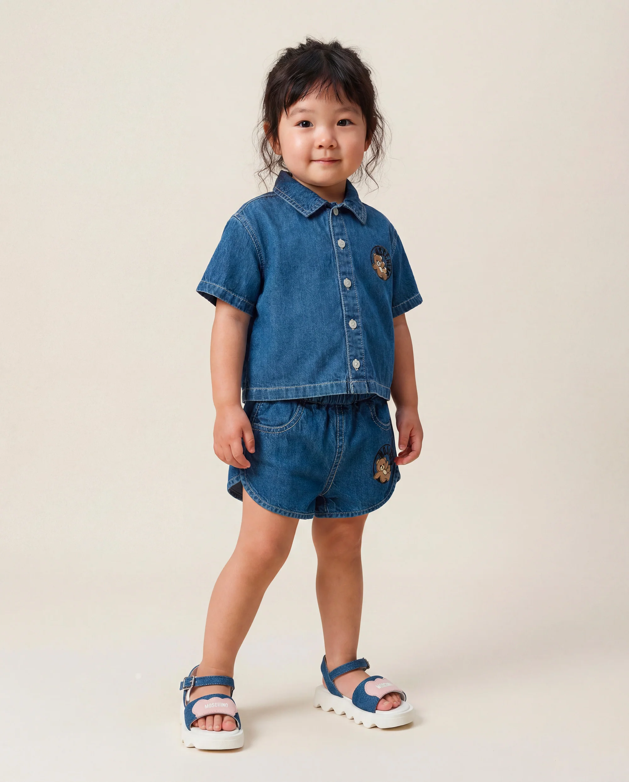 Moschino Kids Short in Denim con Logo Teddy Bear per Neonate