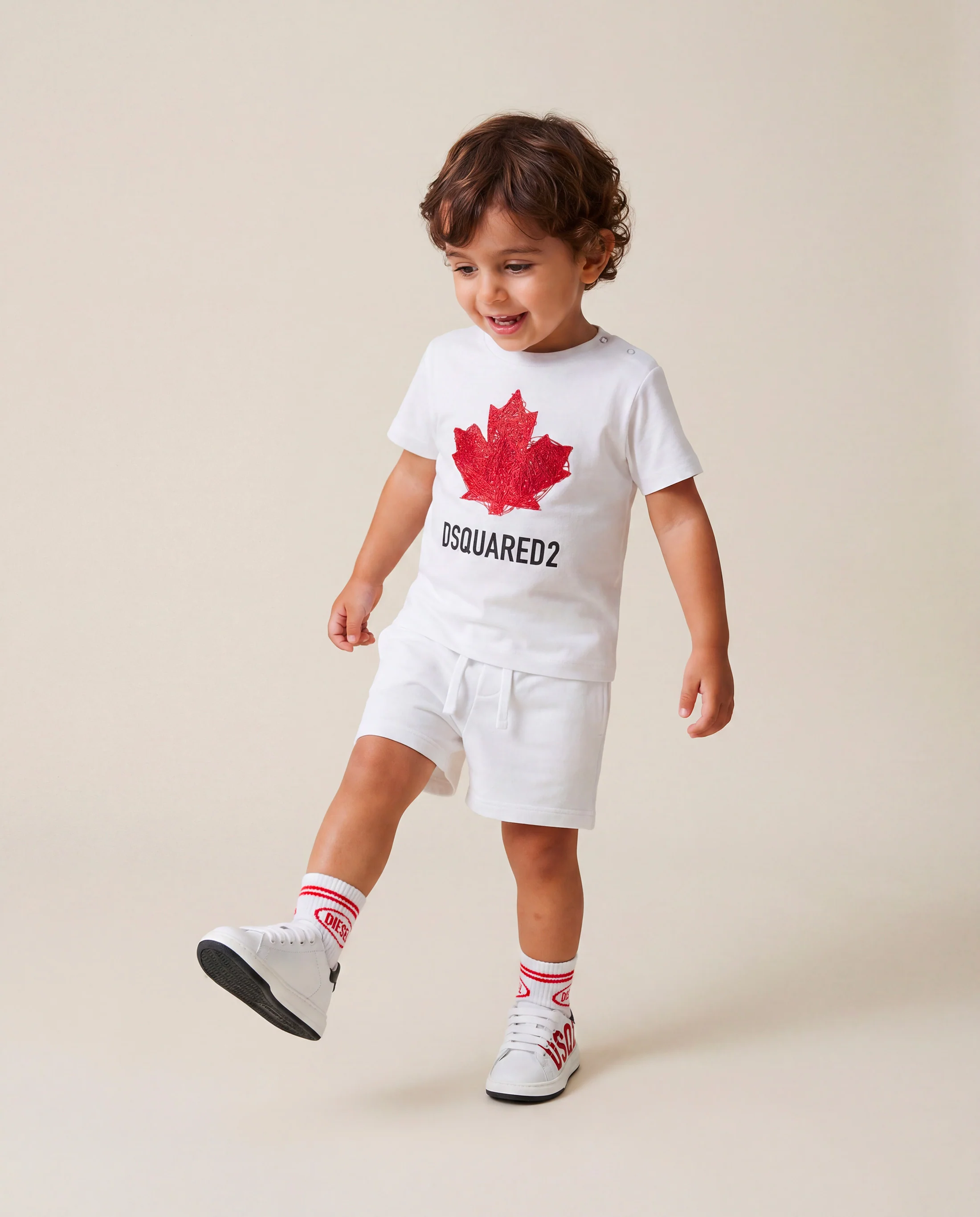 Dsquared2 Kids T-shirt Bianca con Stampa Logo Foglio D'acero con Bottoni Apertura Spalla per Neonati